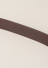 Close-up of a brown leather belt