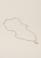 Grey beaded necklace with gold pendant