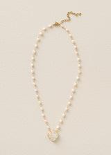 Peal necklace with floral pendant detail
