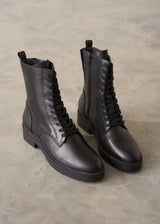 Black leather lace up ankle boots.