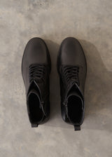 Black leather lace up ankle boots.