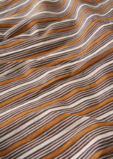 Textile with wavy brown and beige pattern