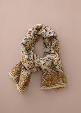 Patterned scarf on a beige background