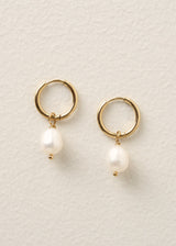 Gold hoop earrings with pearl drops