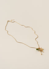 Gold necklace with fish and pearl charms
