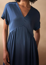 Dark blue satin dress with pockets