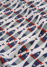 Waffle beach towel with blue and red fish pattern