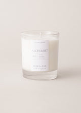 Alchemist candle with a scents of neroli, lavender and rosemary on a beige background