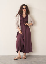 Woman wearing plum satin dress