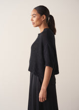 Black short sleeve sweater with sparkle detail