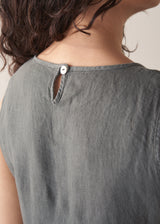 Woman wearing khaki linen tulip dress