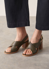 Khaki green leather sandal with wooden heel and buckle detail