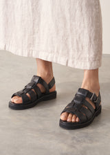 Black leather cut-out fisherman sandals with chunky sole
