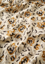 Close up of mustard yellow lightweight cotton scarf 