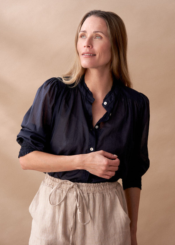 Light cotton navy blouse with ruched cuffs