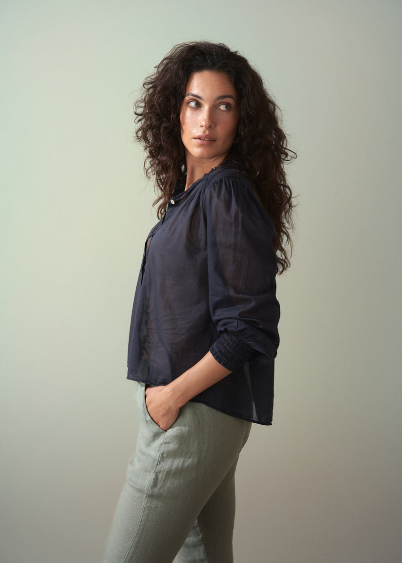 Light cotton navy blouse with ruched cuffs