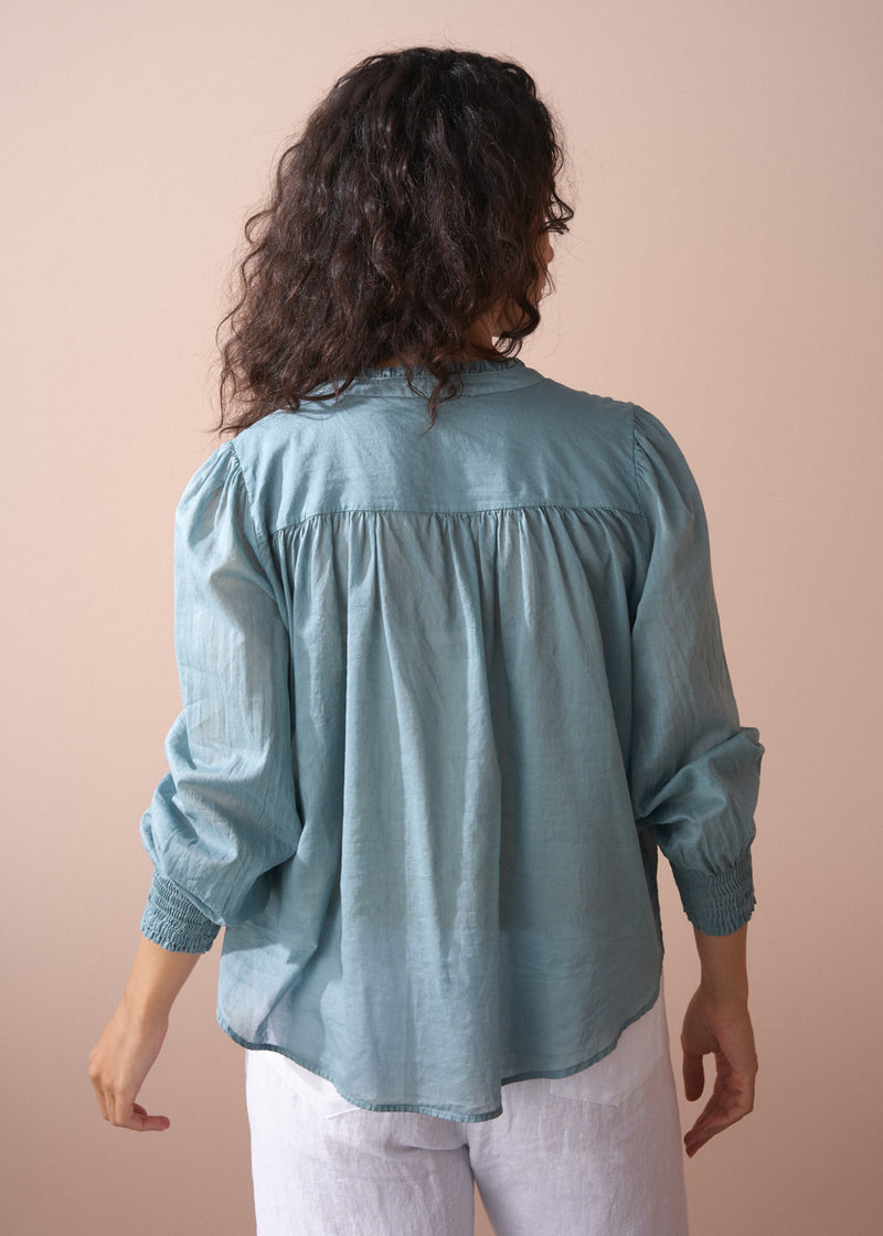 Light sage aqua cotton blouse with shirred cuffs