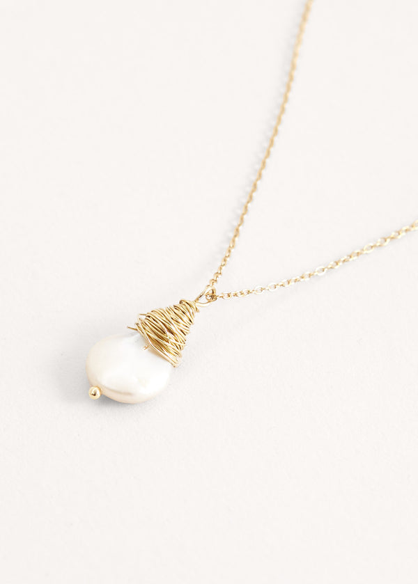 Gold necklace with pearl drop
