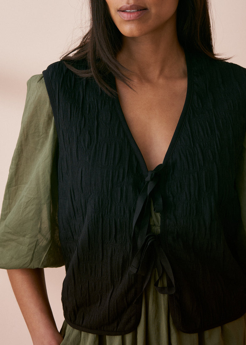 Black textured bow front gilet