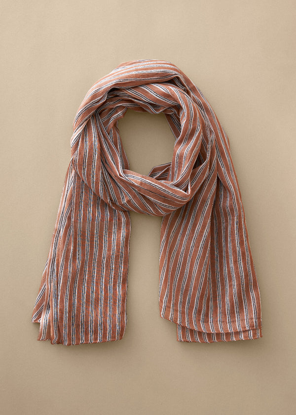 Striped scarf on a beige background