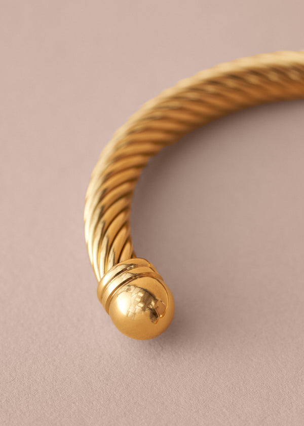 Gold twisted braid style bangle