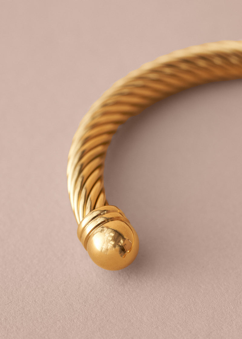 Gold twisted braid style bangle