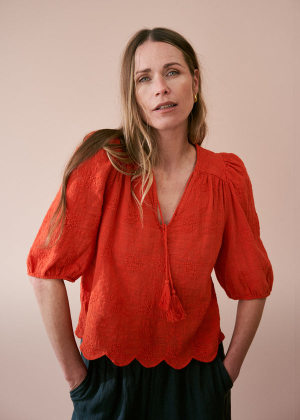 Red puff sleeve blouse with embroidered and scallop hem