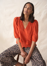 Red puff sleeve blouse with embroidered and scallop hem