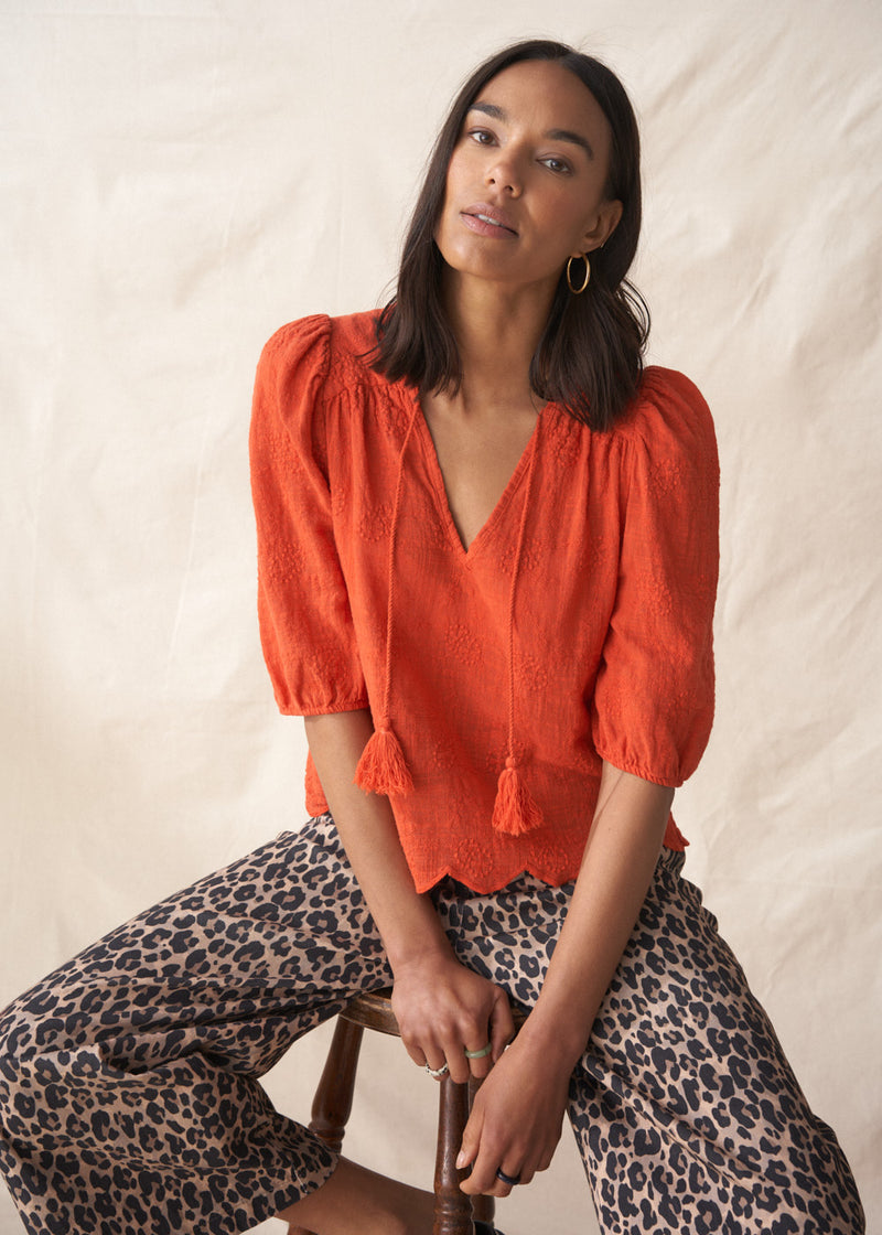 Red puff sleeve blouse with embroidered and scallop hem