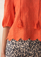 Red puff sleeve blouse with embroidered and scallop hem