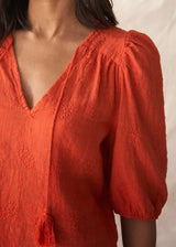 Red puff sleeve blouse with embroidered and scallop hem