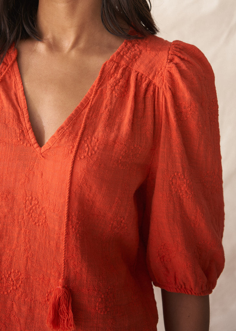 Red puff sleeve blouse with embroidered and scallop hem