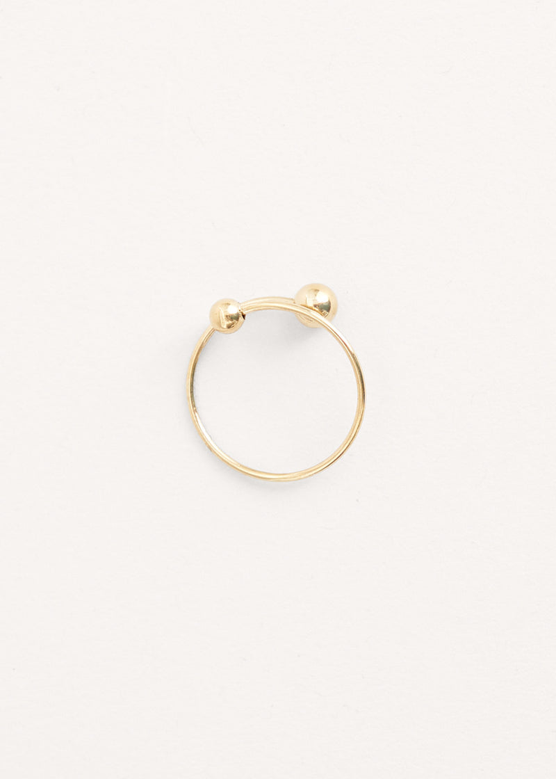Twisted gold ring with ball details