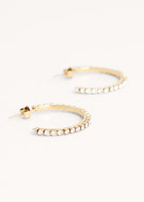 Gold hoop earrings with crystals