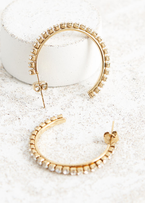 Gold hoop earrings with crystals