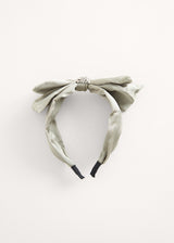Green bow headband with crystal embellishment