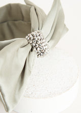 Green bow headband with crystal embellishment