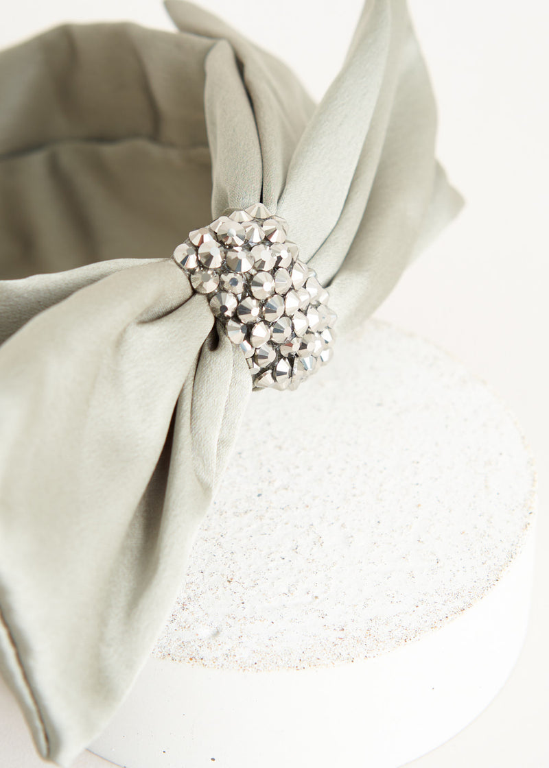 Green bow headband with crystal embellishment