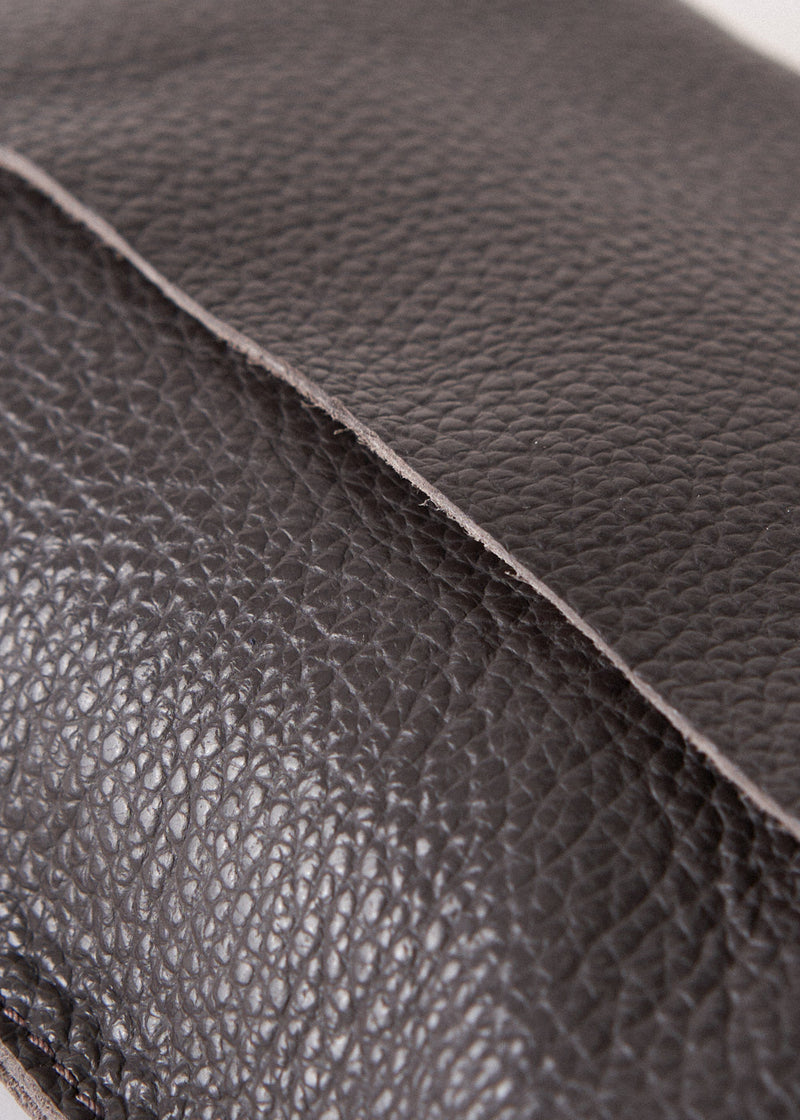 Dark brown leather flap cross body bag