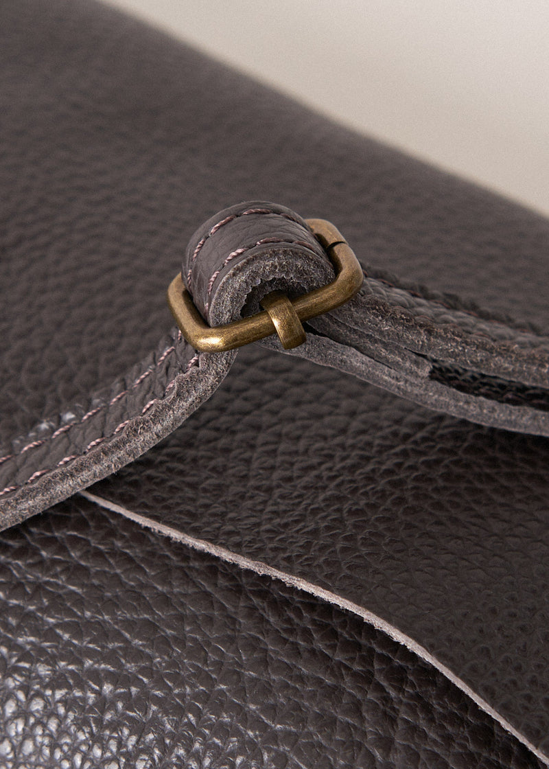 Dark brown leather flap cross body bag