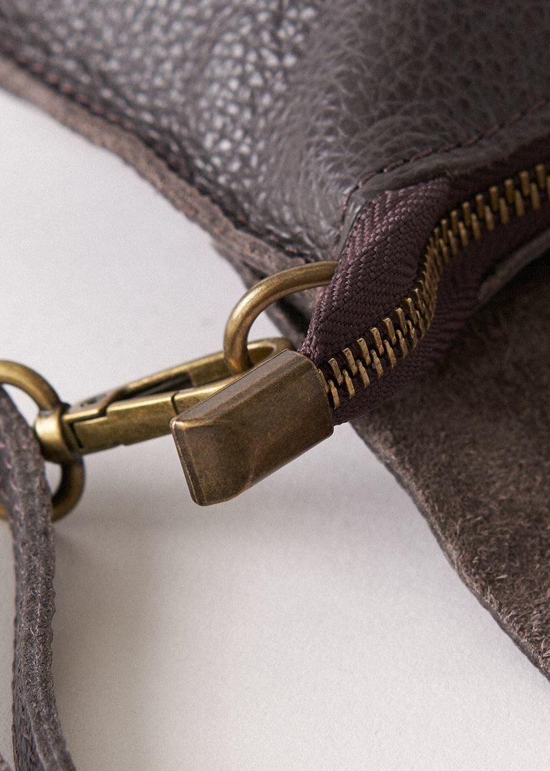 Dark brown leather flap cross body bag