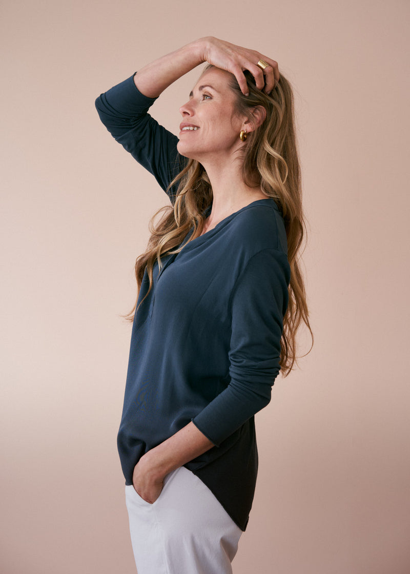Dark teal long sleeve relaxed jersey top