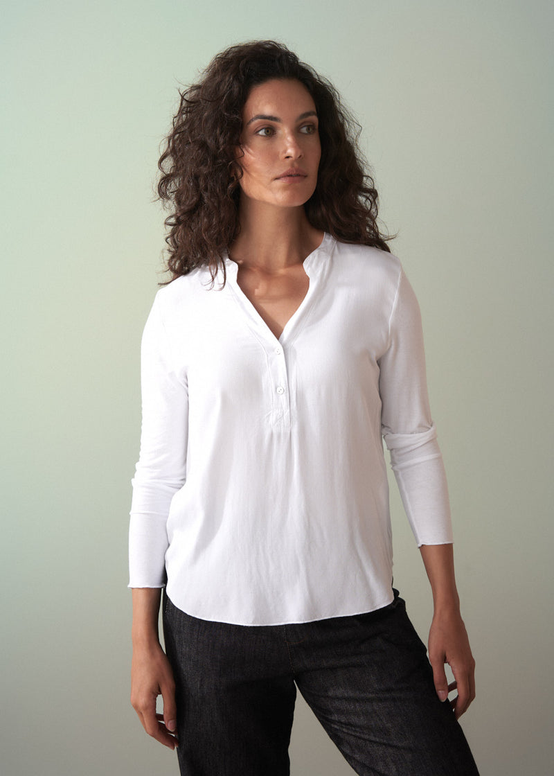 Long sleeve white top with button detail