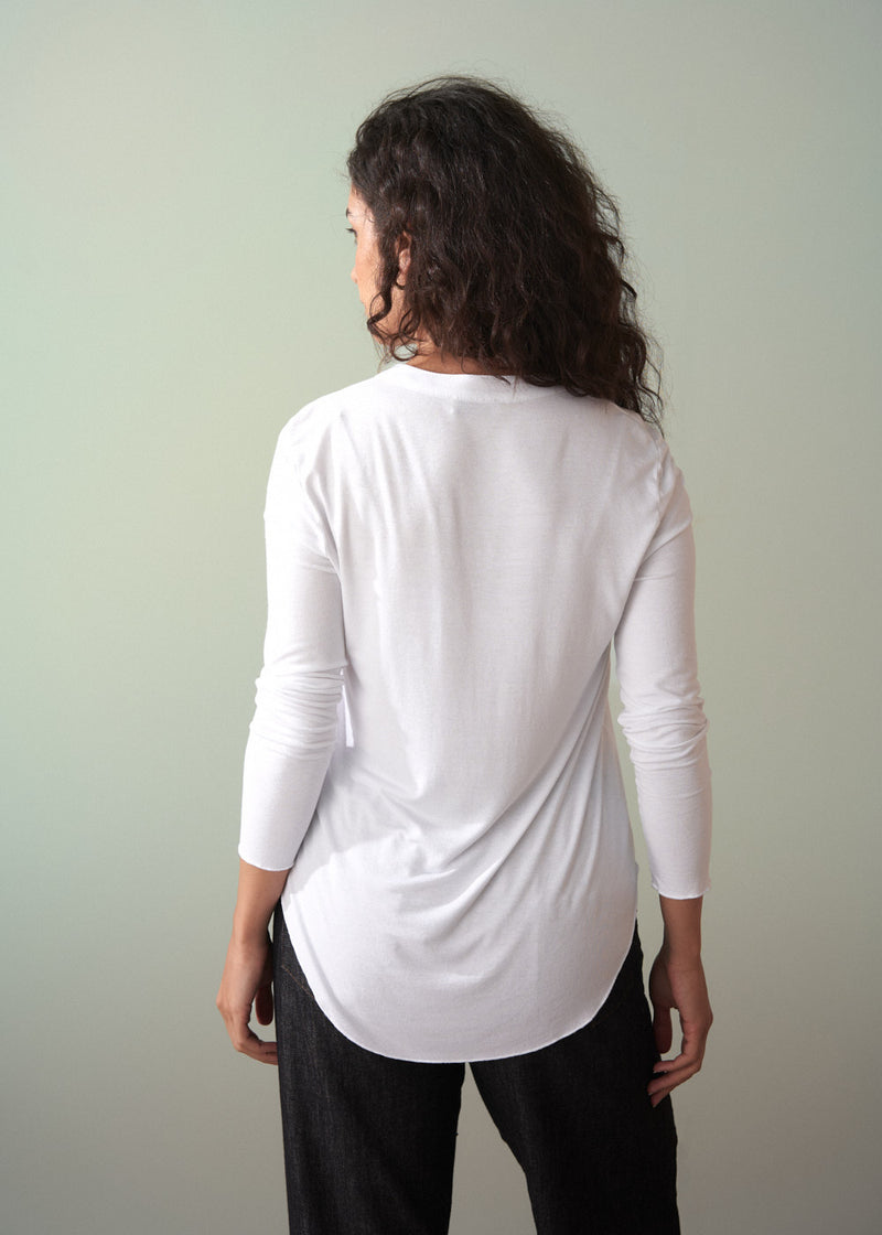 Long sleeve white top with button detail