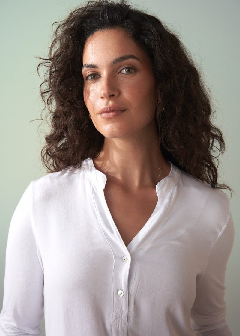 Long sleeve white top with button detail