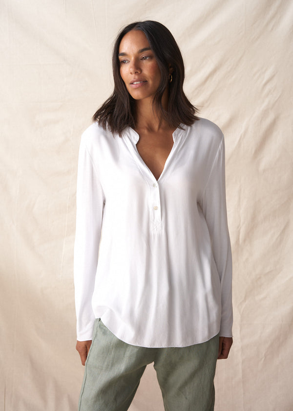 Long sleeve white top with button detail
