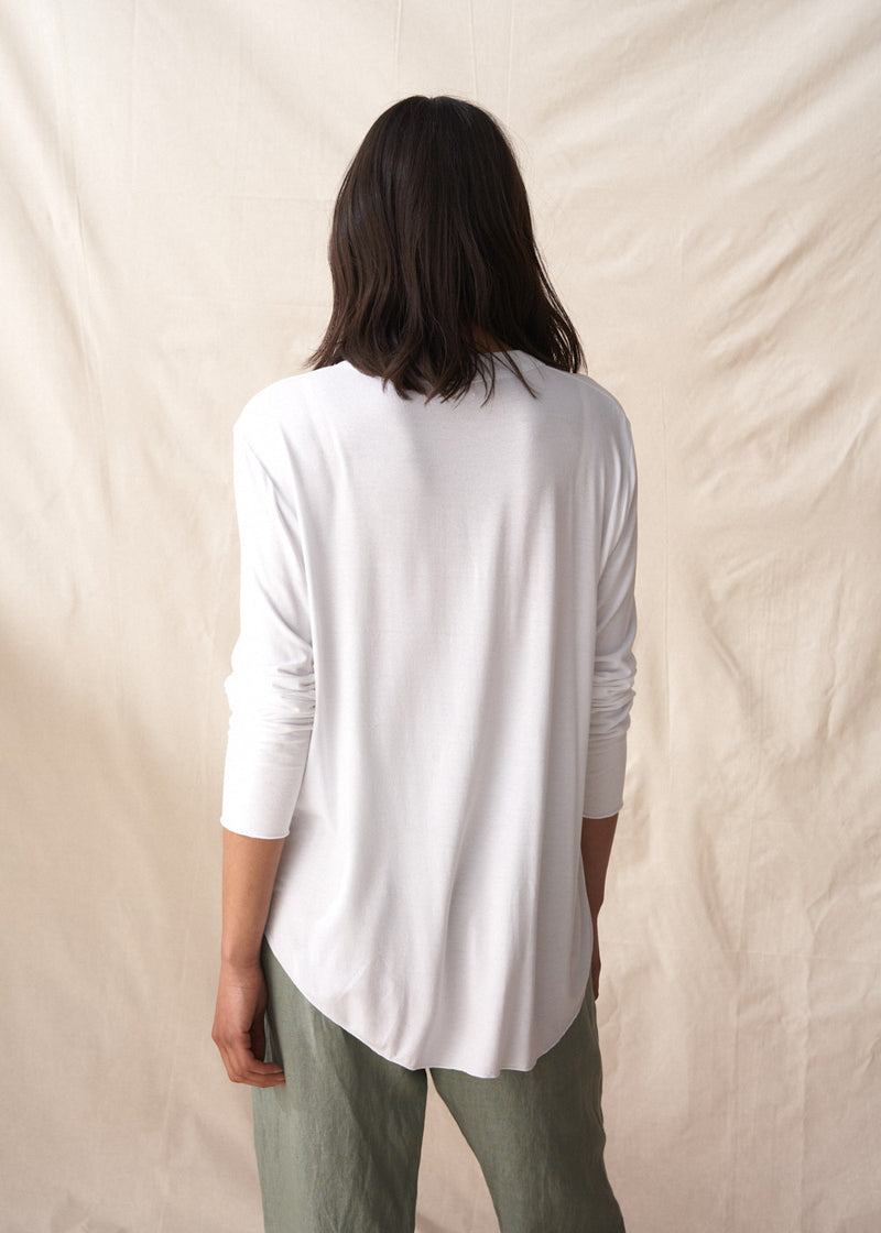Long sleeve white top with button detail