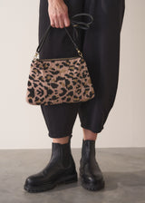 Leopard print beaded clutch bag with detachable leather strap