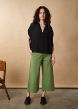 Black lightweight semi-sheer short sleeve top