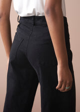 Black wide leg raw hem cotton trousers